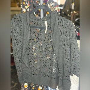 Leo and Nicole Open knit cardigan.